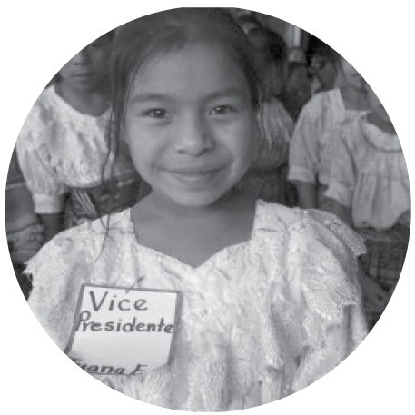 Little girl with a name tag labeled Vice Presidente