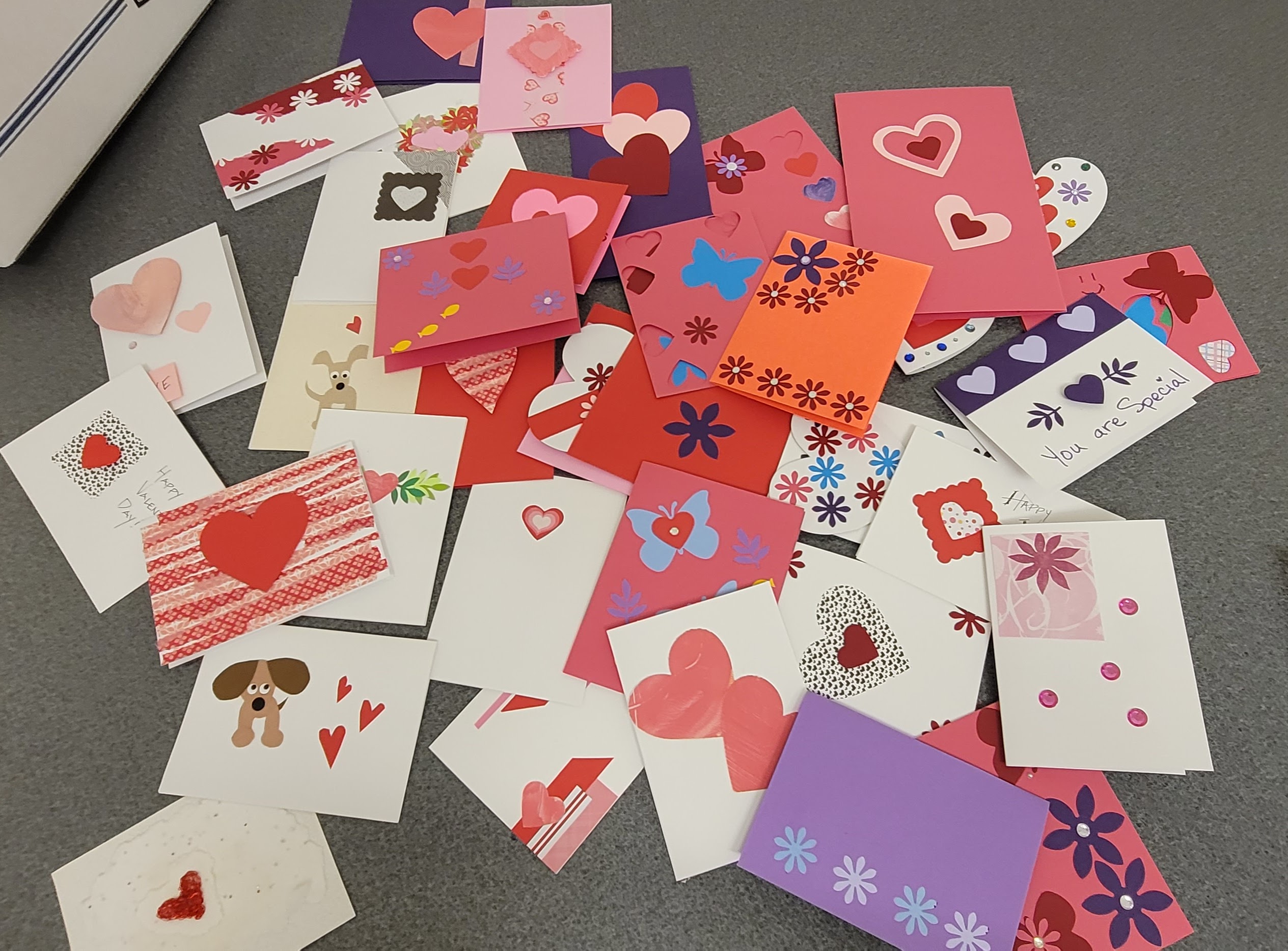 a pile of valentines day cards
